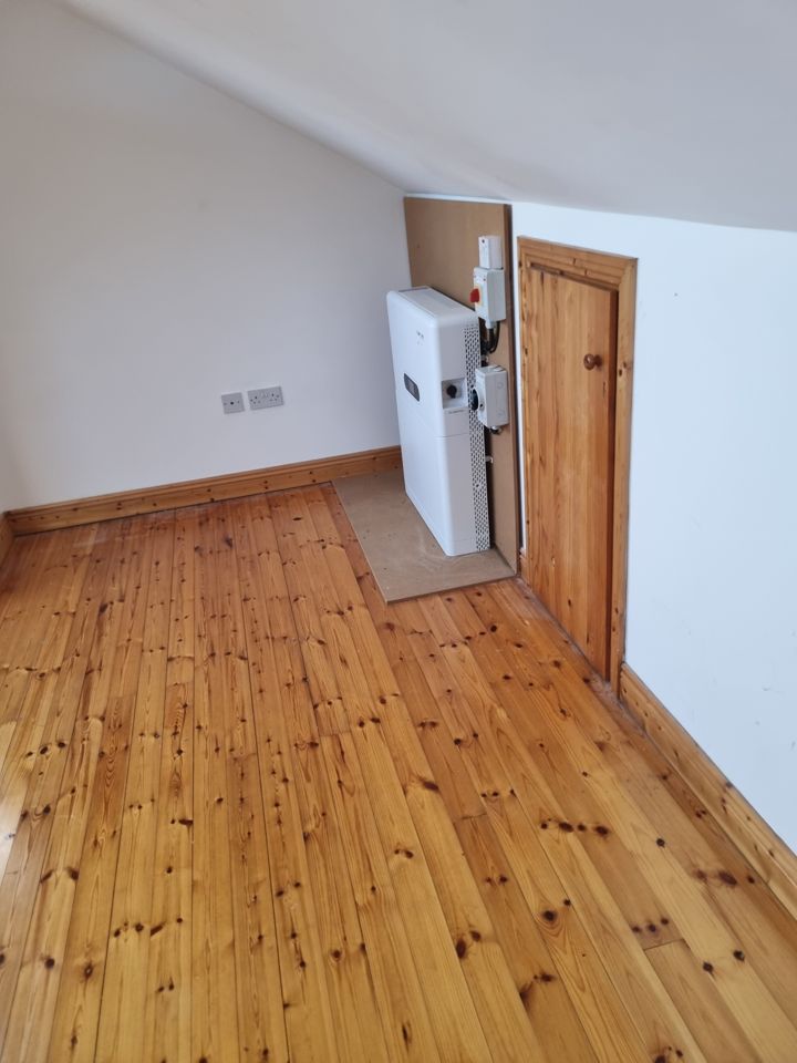 The same attic after the clearance, emptied and swept