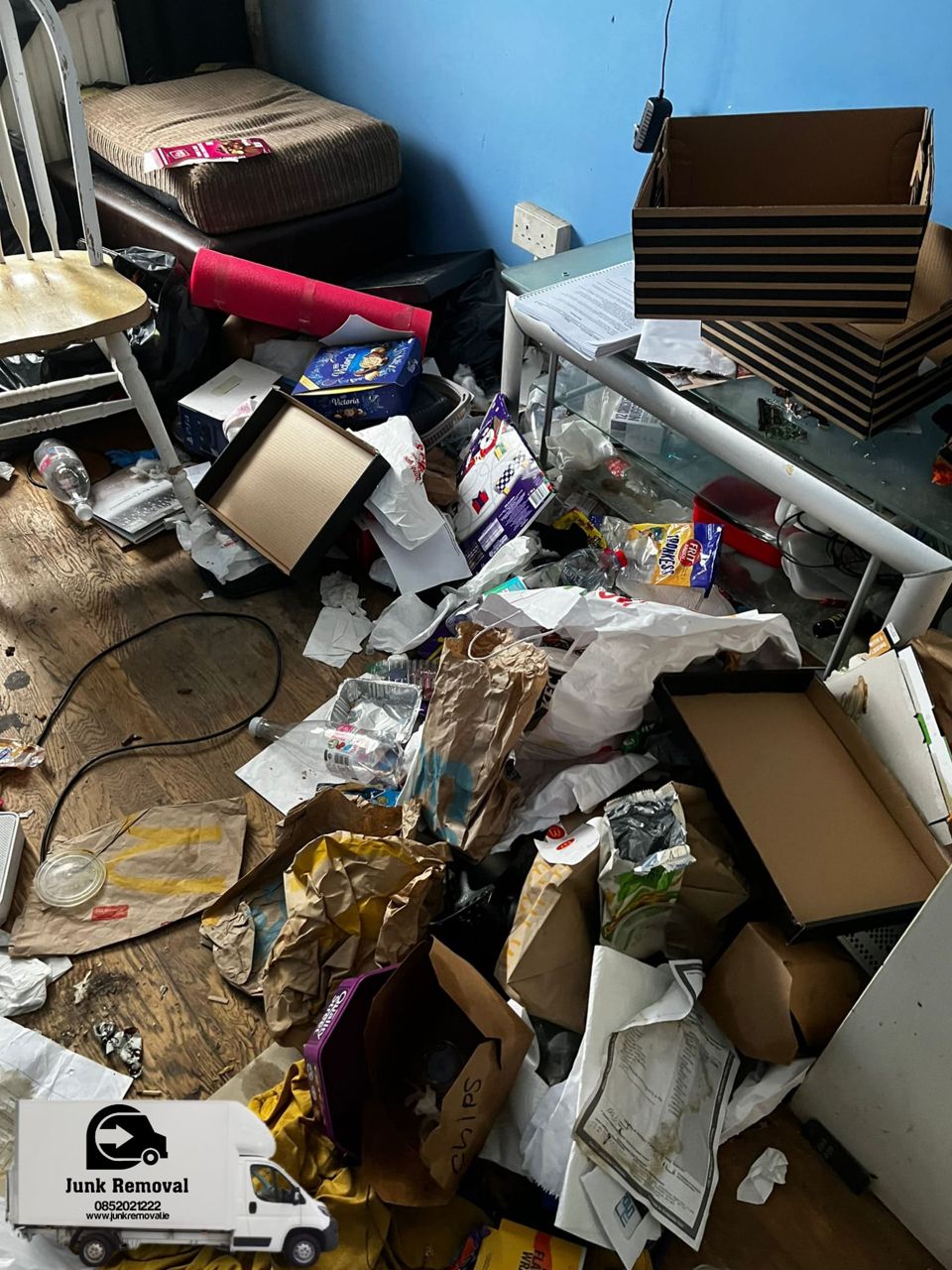 Cluttered garage before clearance